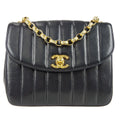 Chanel 1991-1994 Black Lambskin Mini Vertical Stitch Round Flap Bag