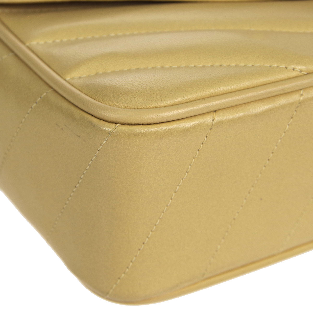 Chanel * 1994-1996 Beige Lambskin Mini Chevron Letter Flap Bag