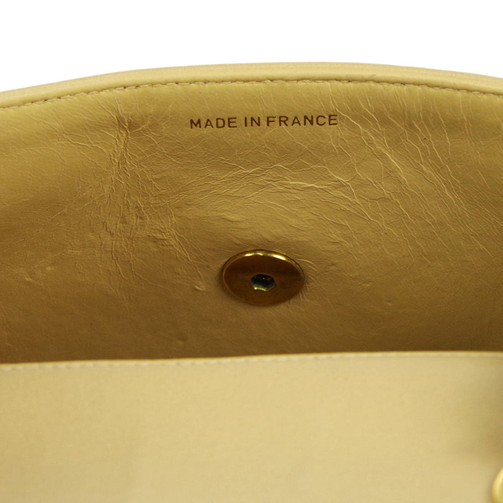 Chanel * 1994-1996 Beige Lambskin Mini Chevron Letter Flap Bag
