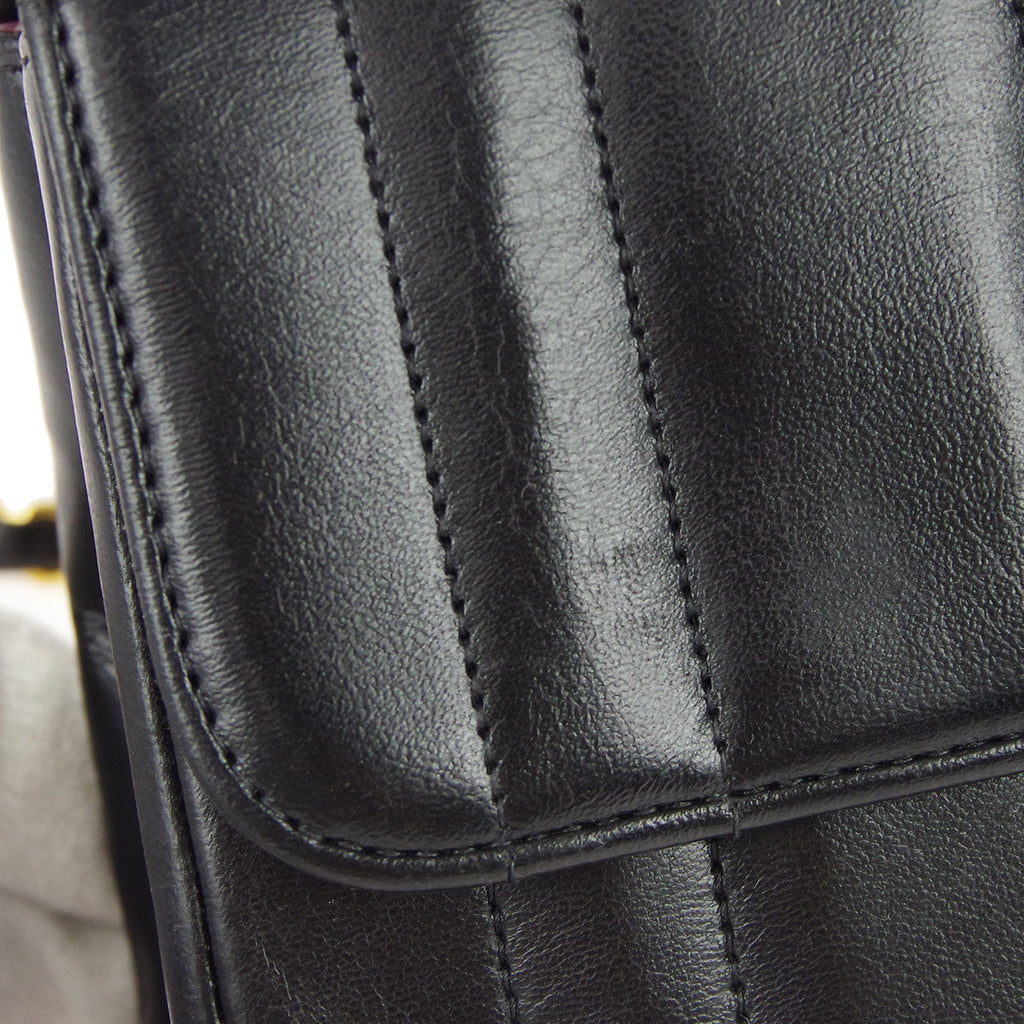 Chanel * 1994-1996 Black Lambskin Mini Vertical Stitch Straight Flap Bag
