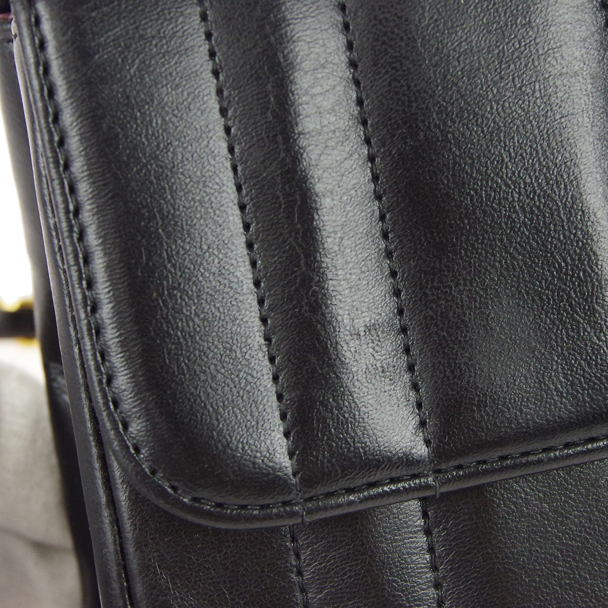 Chanel * 1994-1996 Black Lambskin Mini Vertical Stitch Straight Flap Bag