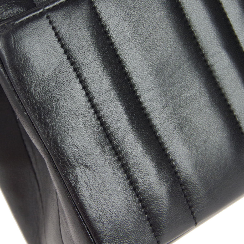 Chanel * 1994-1996 Black Lambskin Mini Vertical Stitch Straight Flap Bag