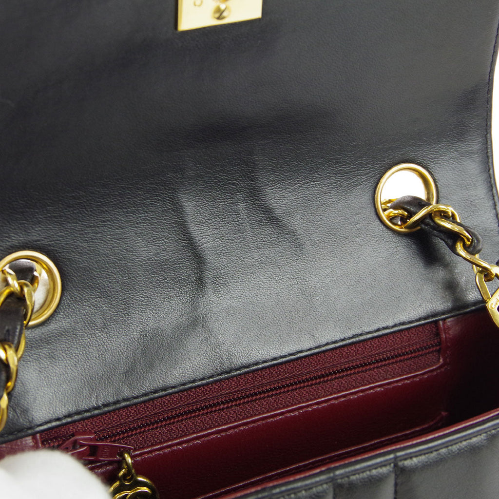 Chanel * 1994-1996 Black Lambskin Mini Vertical Stitch Straight Flap Bag
