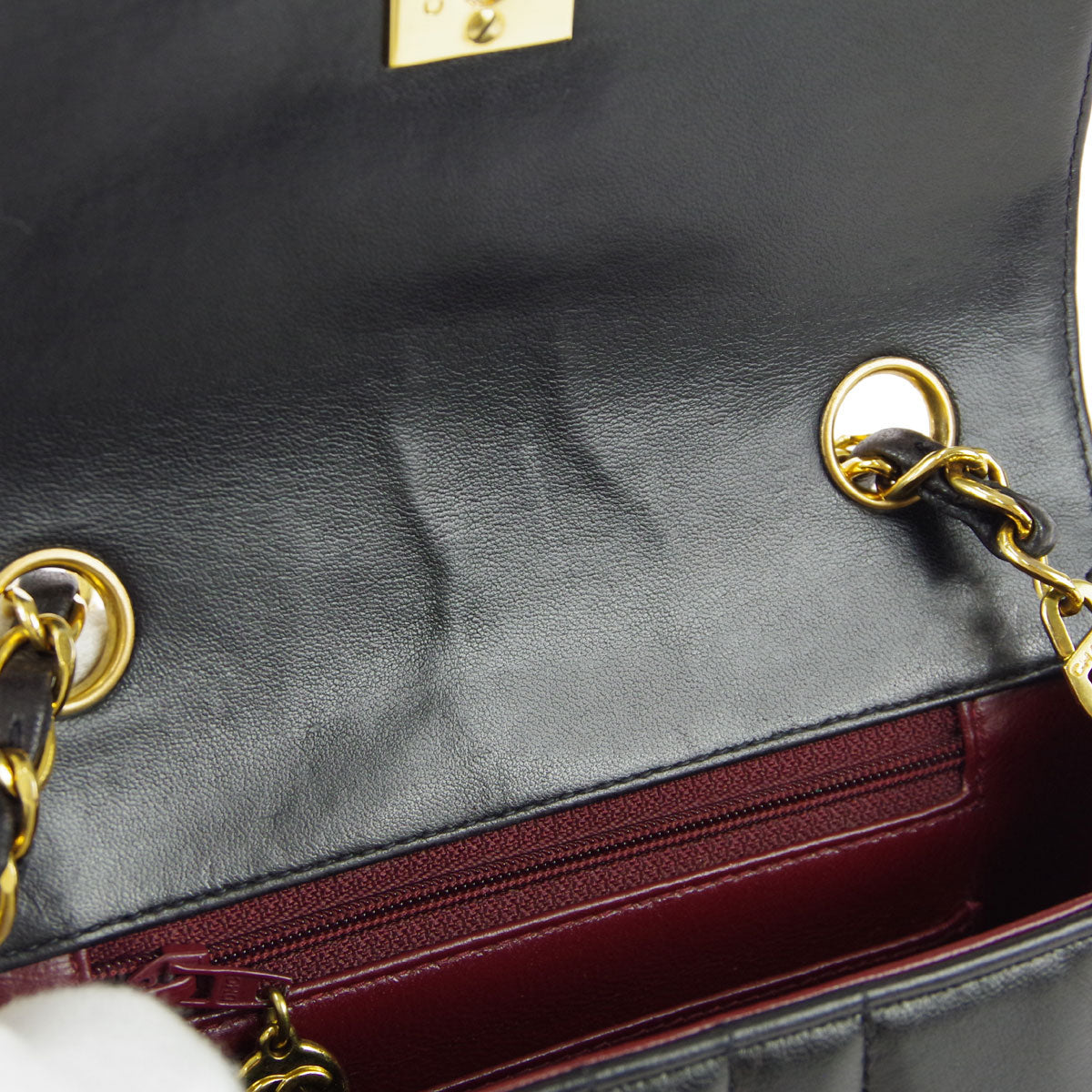 Chanel * 1994-1996 Black Lambskin Mini Vertical Stitch Straight Flap Bag
