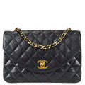 Chanel 1994-1996 Round Flap Bag Small Black Lambskin