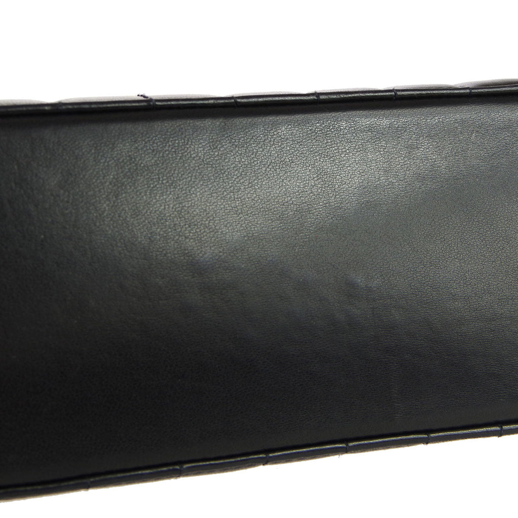 Chanel * 1991-1994 Black Lambskin Mini Vertical Stitch Flap Bag
