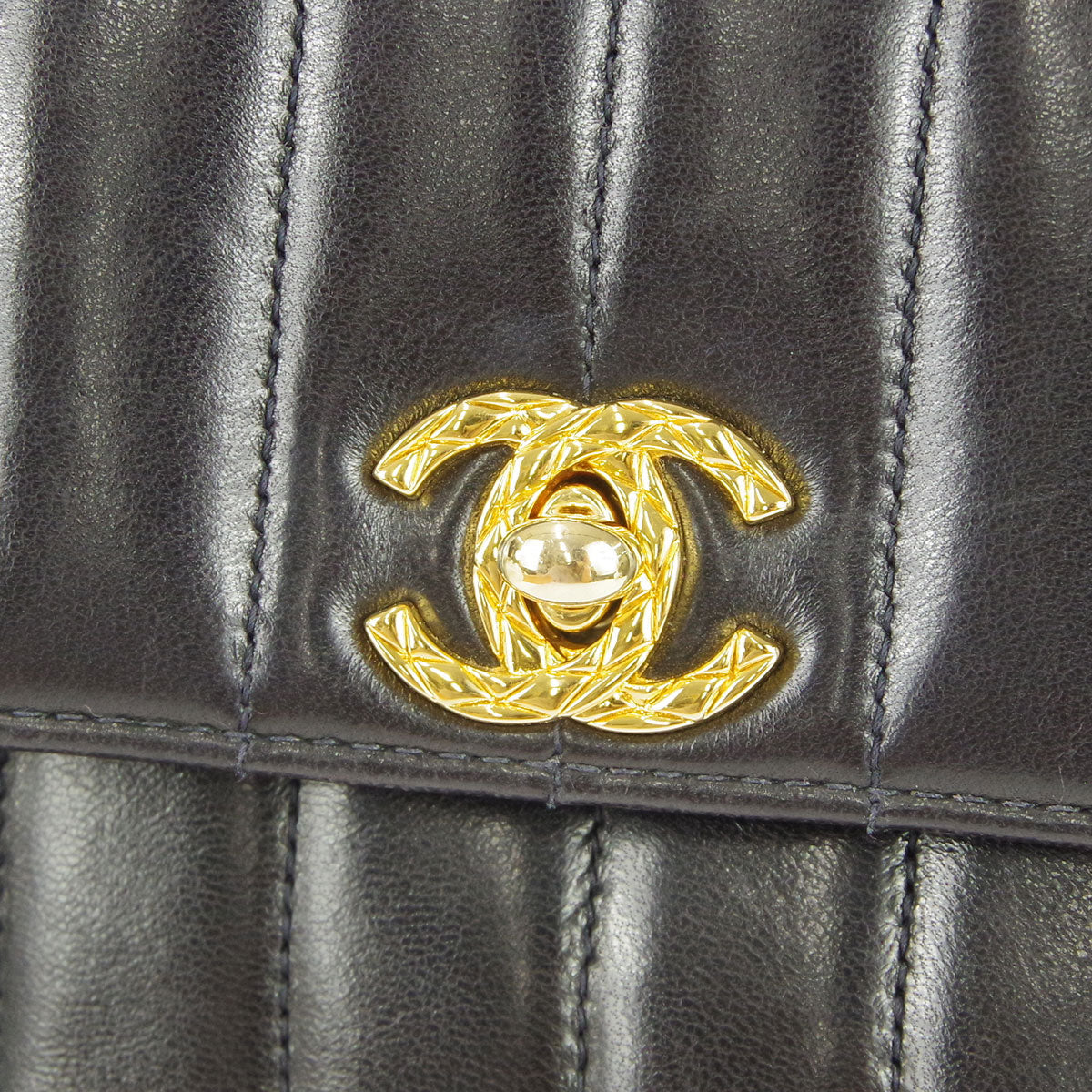 Chanel * 1991-1994 Black Lambskin Mini Vertical Stitch Flap Bag