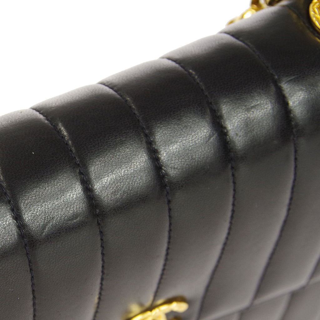 Chanel * 1991-1994 Black Lambskin Mini Vertical Stitch Flap Bag