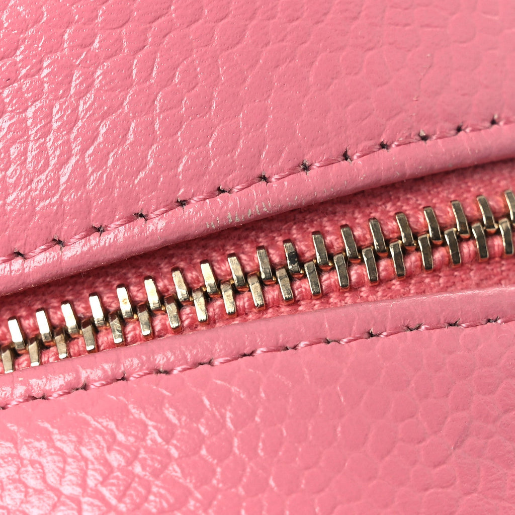 Chanel Caviar Camellia Embossed Round Clutch With Chain Pink