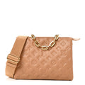Louis Vuitton Lambskin Embossed Monogram Coussin PM Camel