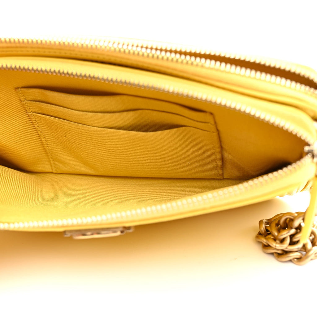 Chanel Caviar Quilted Small Boy Clutch With Chain Yellow