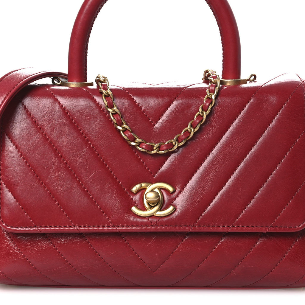 Chanel Aged Calfskin Chevron Quilted Mini Coco Handle Flap Red