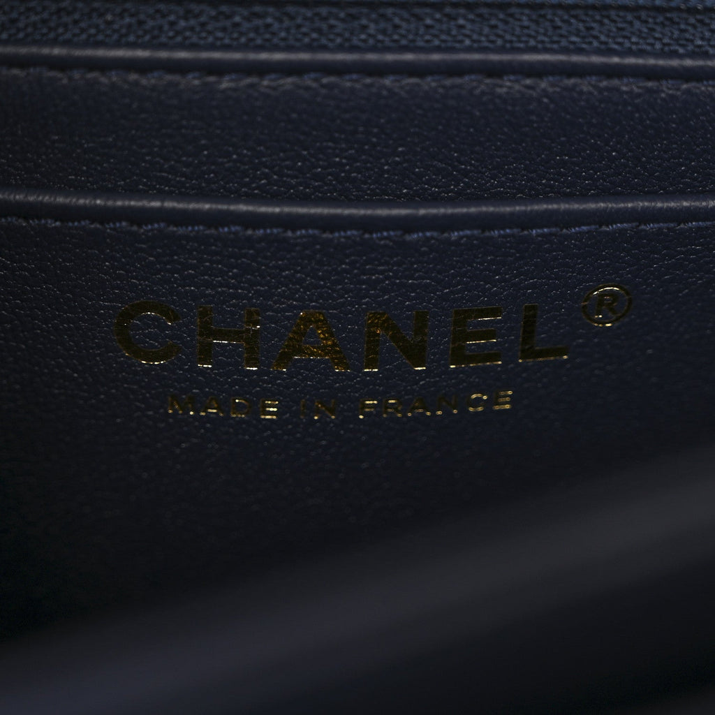 Chanel Shiny Caviar Quilted Mini Top Handle Flap Navy Blue