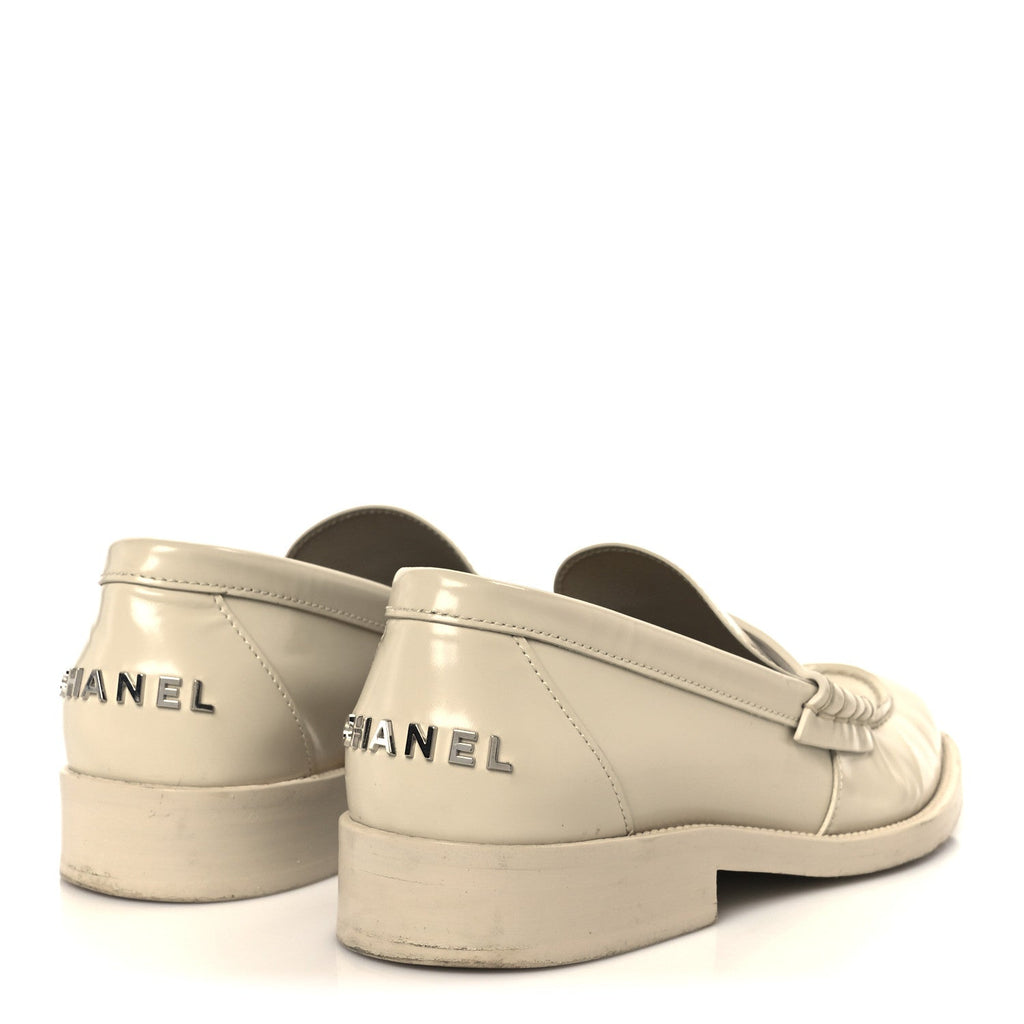 Chanel Shiny Calfskin Logo Loafers 38.5 Beige