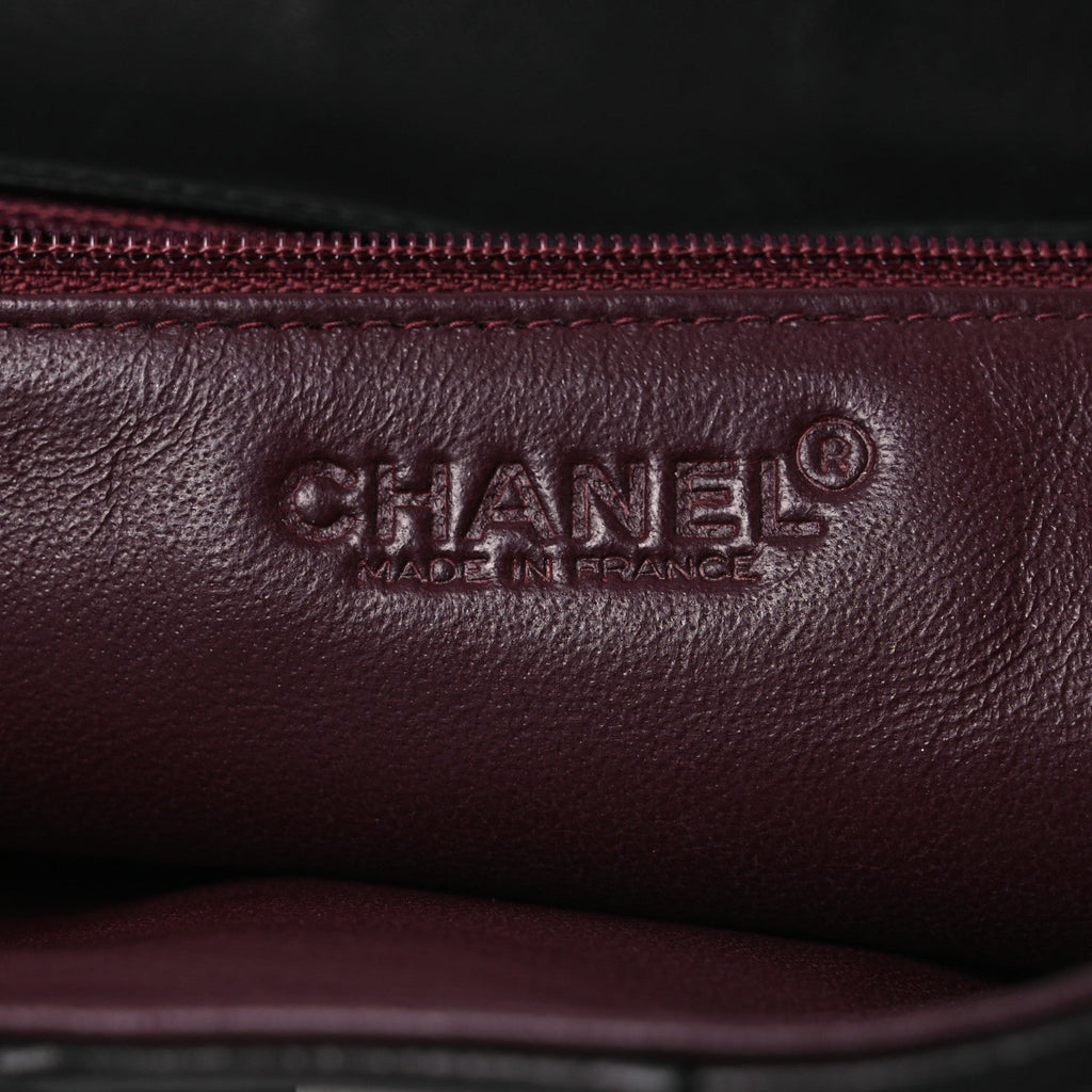 Chanel Lambskin Vertical Quilted Clutch Black