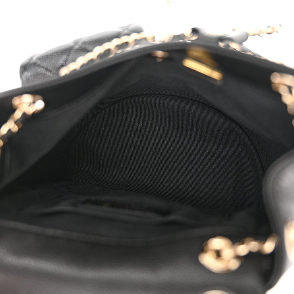 Chanel Shiny Caviar Quilted Medium Duma Pockets Drawstring Backpack Black