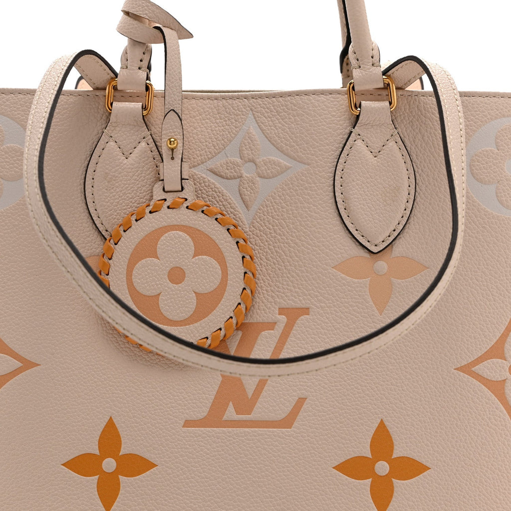 Louis Vuitton Empreinte Monogram Giant By The Pool Onthego MM Cream Saffron