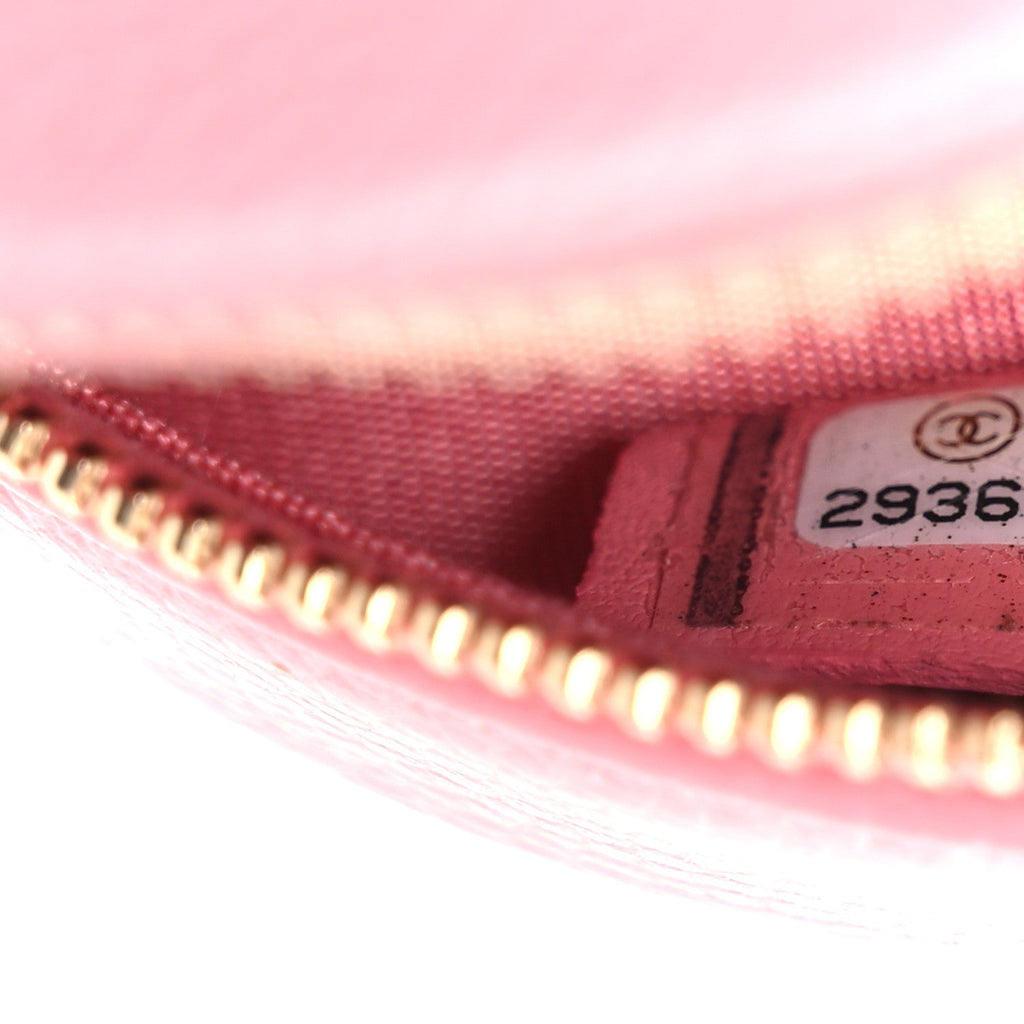 Chanel Caviar Camellia Embossed Round Clutch With Chain Pink
