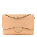 Chanel Caviar Quilted Jumbo Double Flap Beige