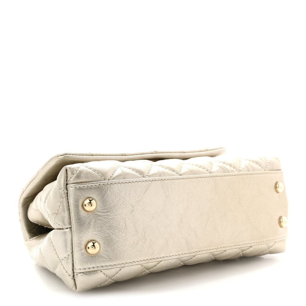Chanel Metallic Aged Calfskin Quilted Mini Coco Handle Flap Gold