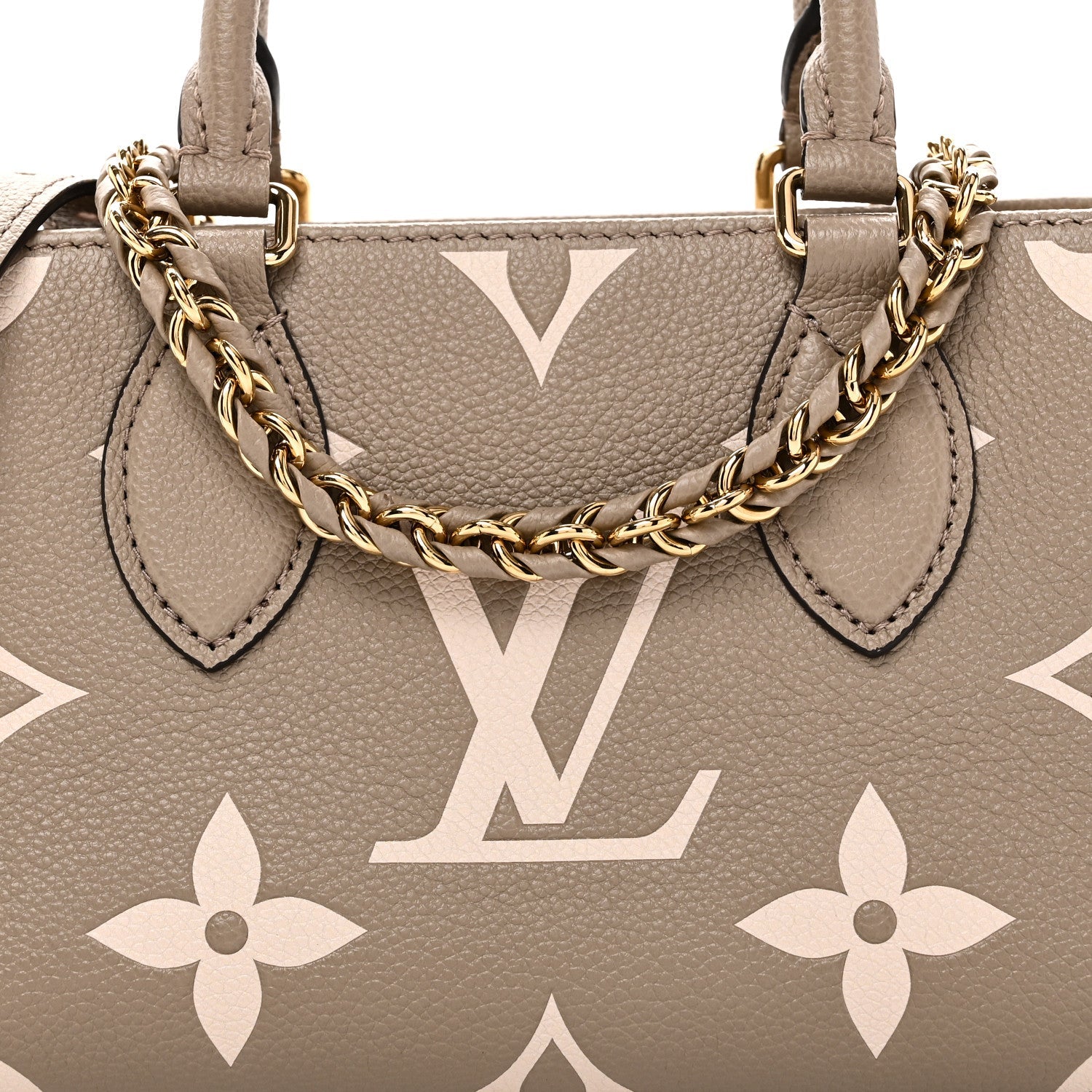Louis Vuitton Empreinte OnTheGo East West Dove Cream