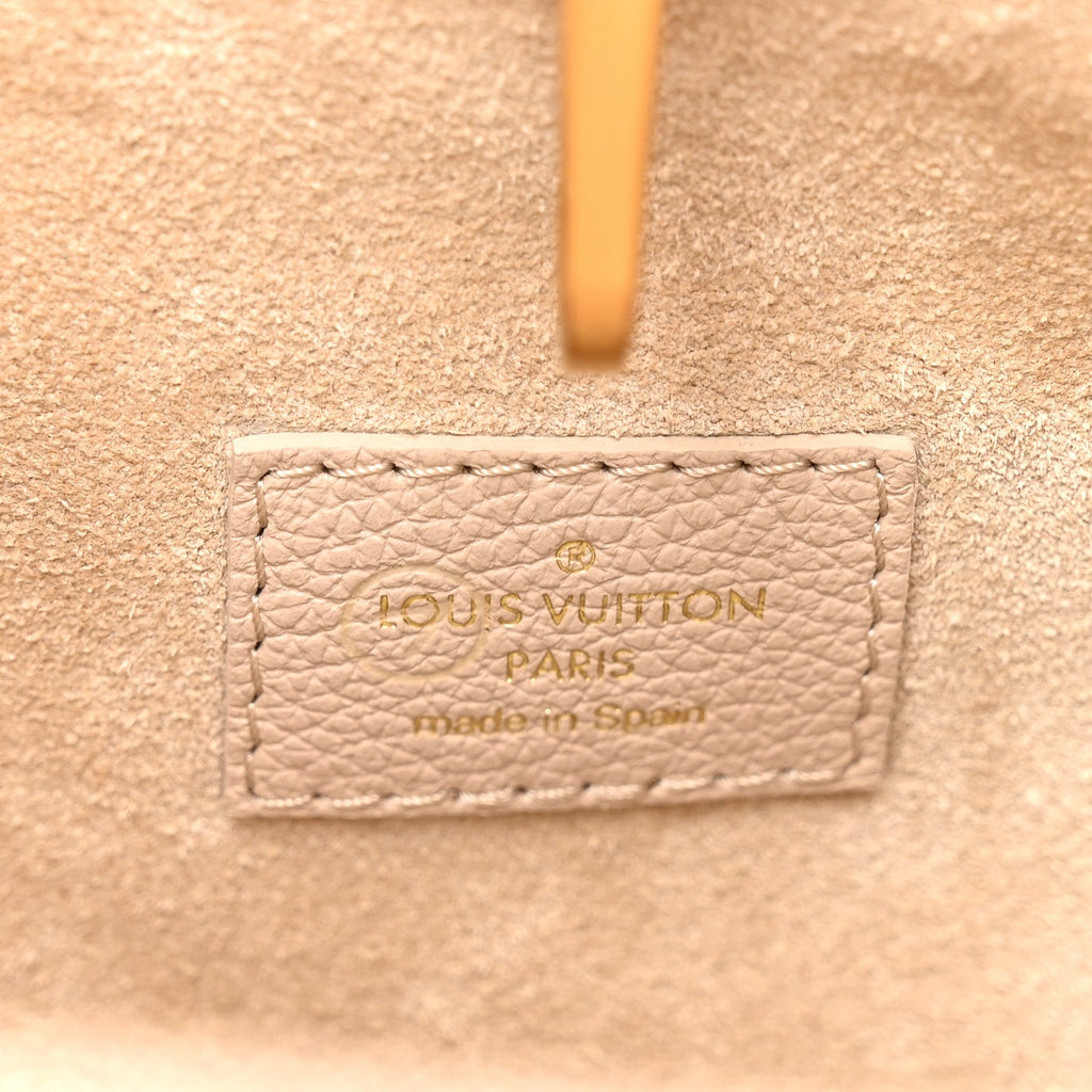 Louis Vuitton Grained Calfskin Low Key Hobo MM Limestone