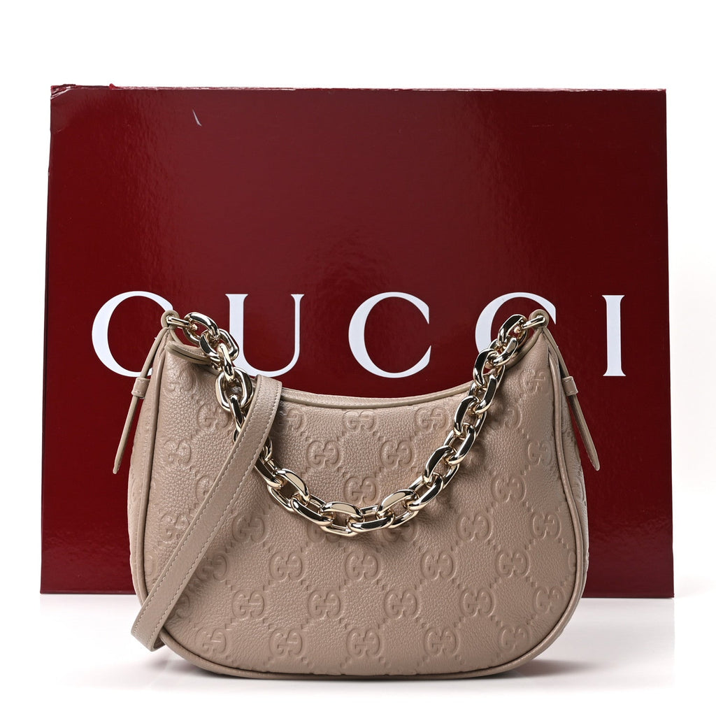 Gucci GG Grainy Calfskin Emblem Medium Half Moon Shoulder Bag Taupe