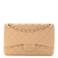 Chanel Caviar Quilted Jumbo Double Flap Beige