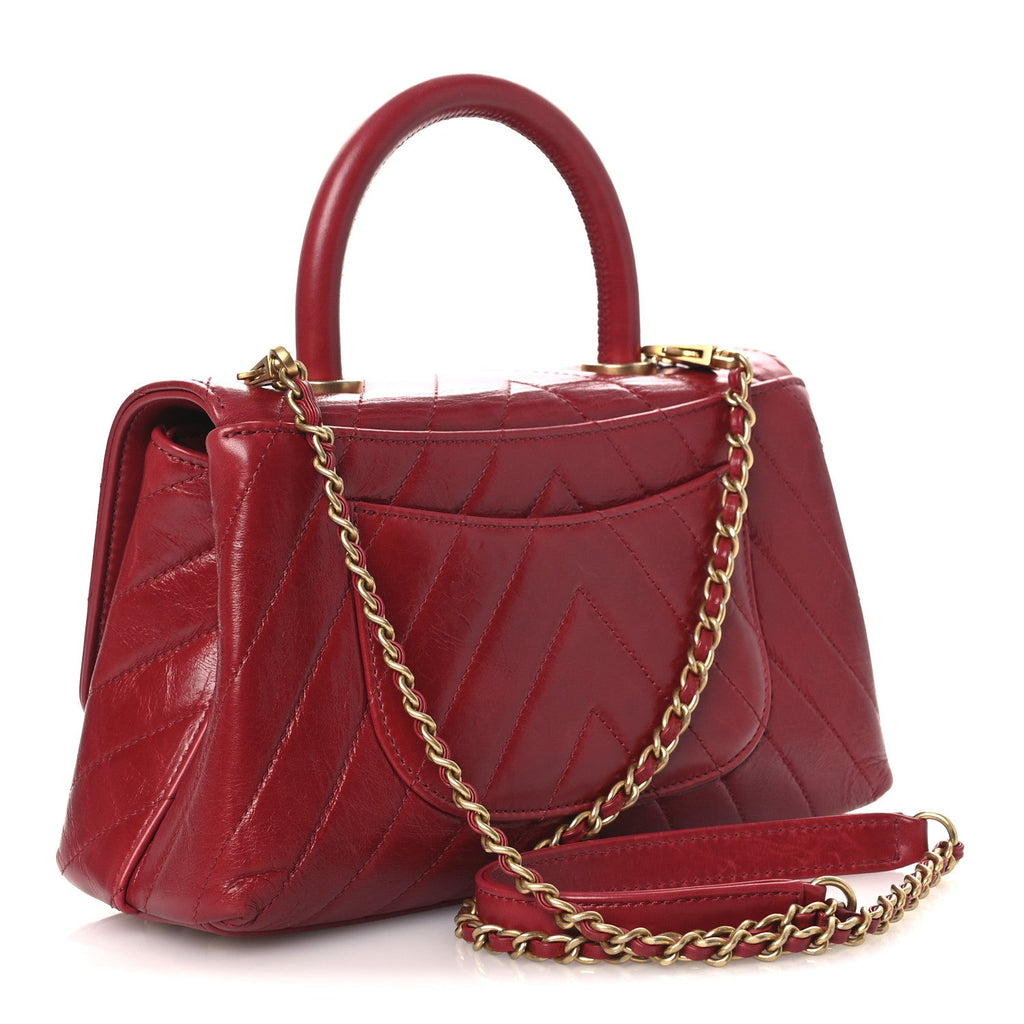 Chanel Aged Calfskin Chevron Quilted Mini Coco Handle Flap Red