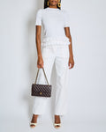 Chanel White Quilted Straight Leg Jeans with Brown Accents and Waist Ties and 31 Rue Cambon CC Logo Detail Size FR 34 (UK 6)