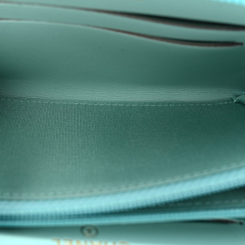 Caviar Quilted Small Boy Zip Around Wallet Light Blue