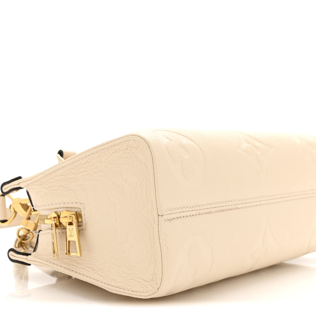 Louis Vuitton Empreinte Monogram Giant OnTheGo East West Creme