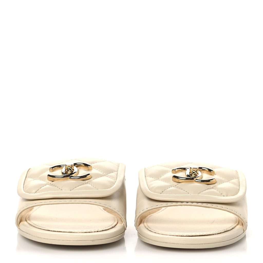 Lambskin Quilted Turnlock Flat Mules 35.5 Ivory