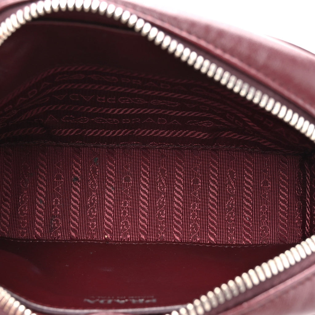 Prada Soft Calfskin Impunture Diagramme Small Camera Bag Granato