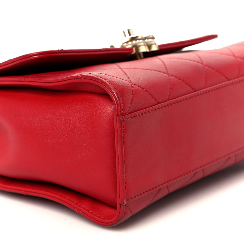 Chanel Lambskin Stitched Pearl Logo Top Handle Flap Red