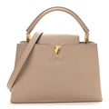 Louis Vuitton Taurillon Capucines PM Galet