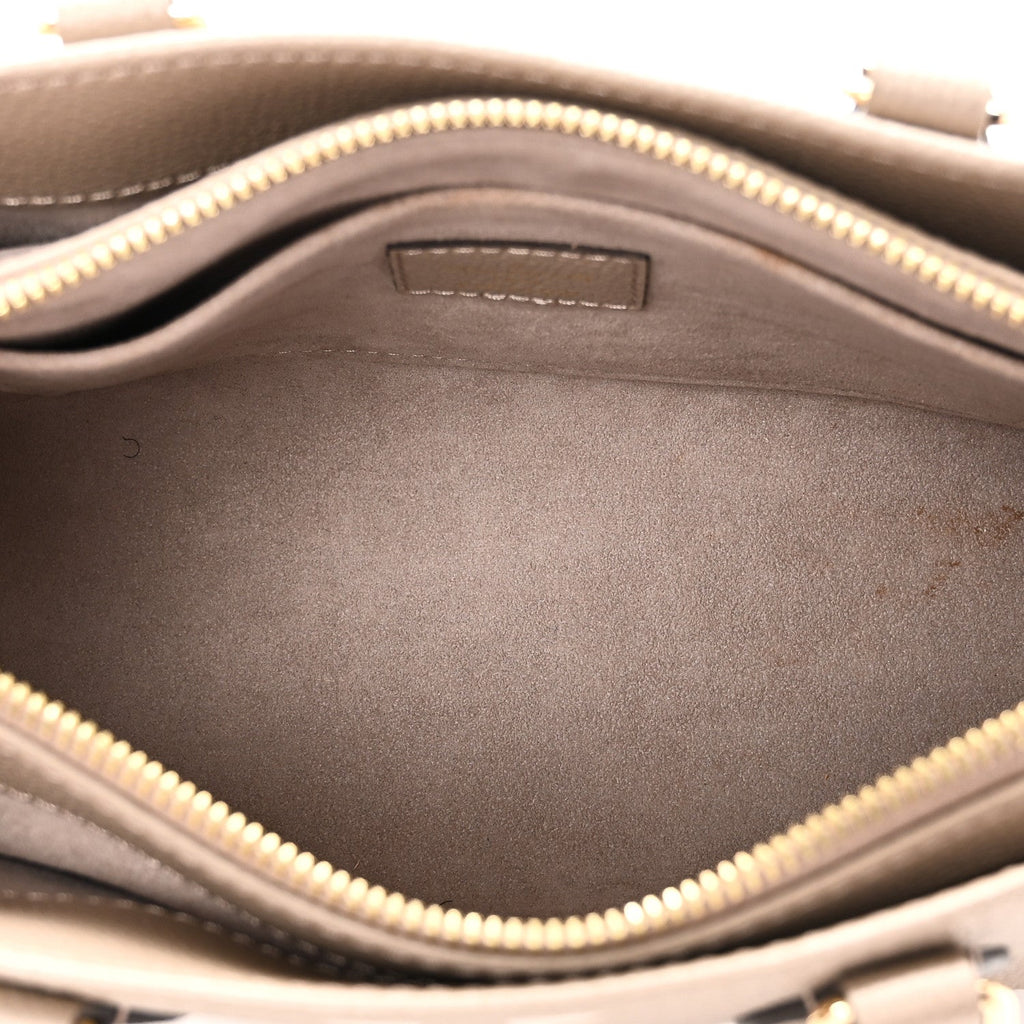 Louis Vuitton Empreinte OnTheGo East West Dove Cream