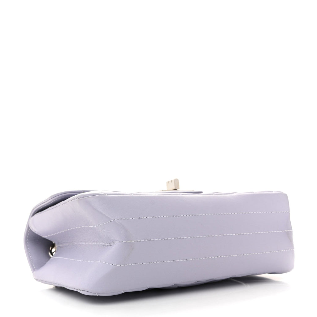 Chanel Aged Calfskin Chevron Quilted 2.55 Reissue Mini Flap Light Purple