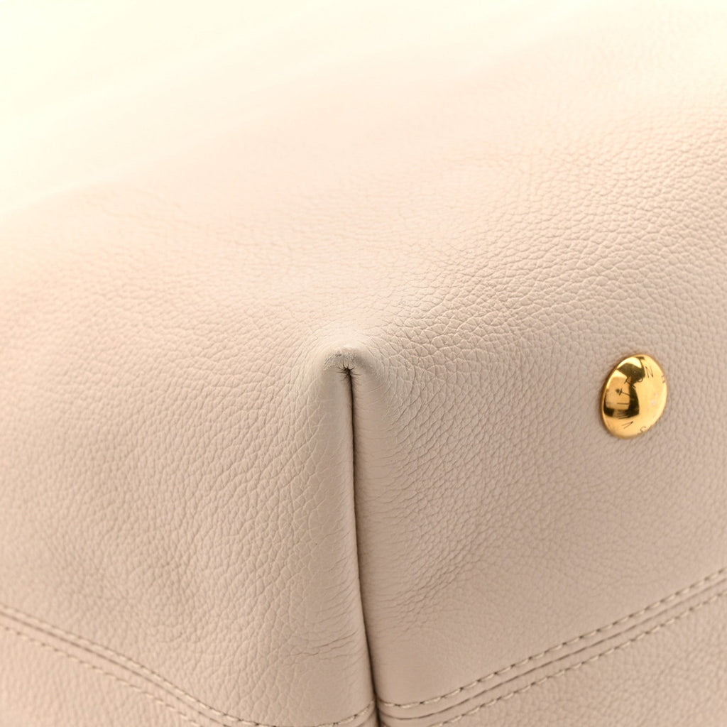 Louis Vuitton Grained Calfskin Low Key Hobo MM Limestone