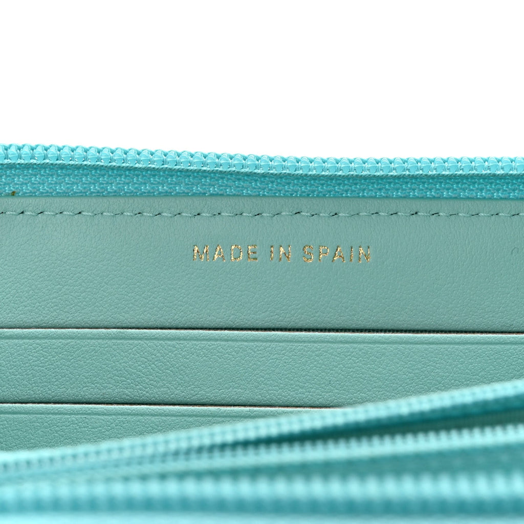 Caviar Quilted Small Boy Zip Around Wallet Light Blue