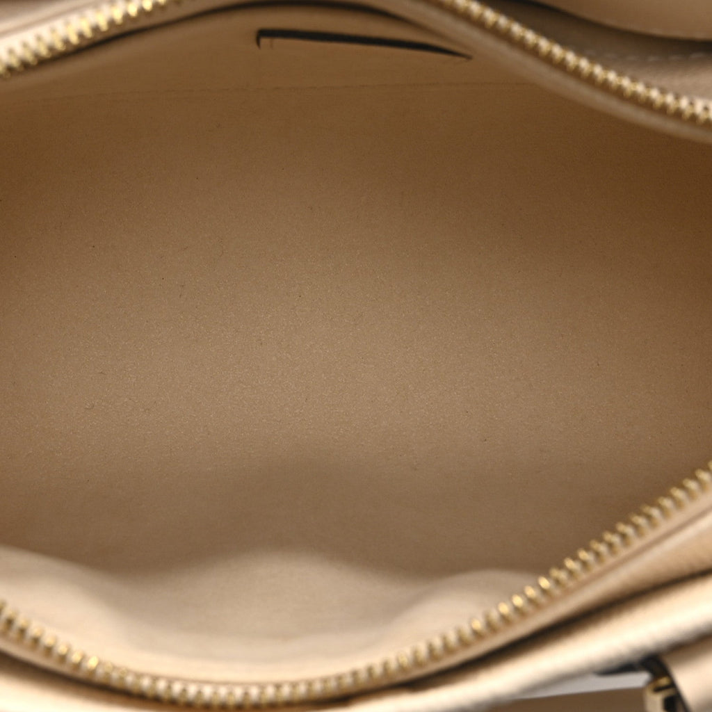Louis Vuitton Empreinte Monogram Giant OnTheGo East West Creme