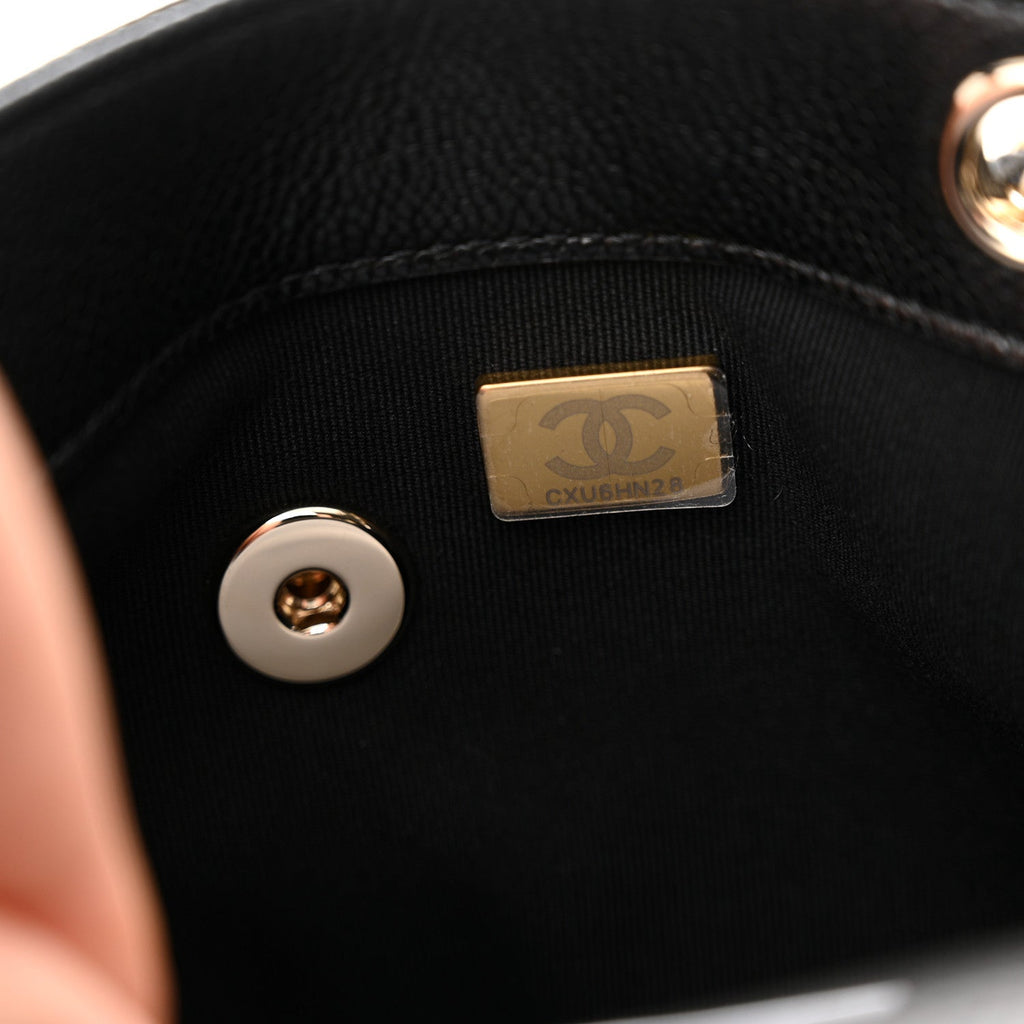 Chanel Shiny Caviar Quilted Medium Duma Pockets Drawstring Backpack Black