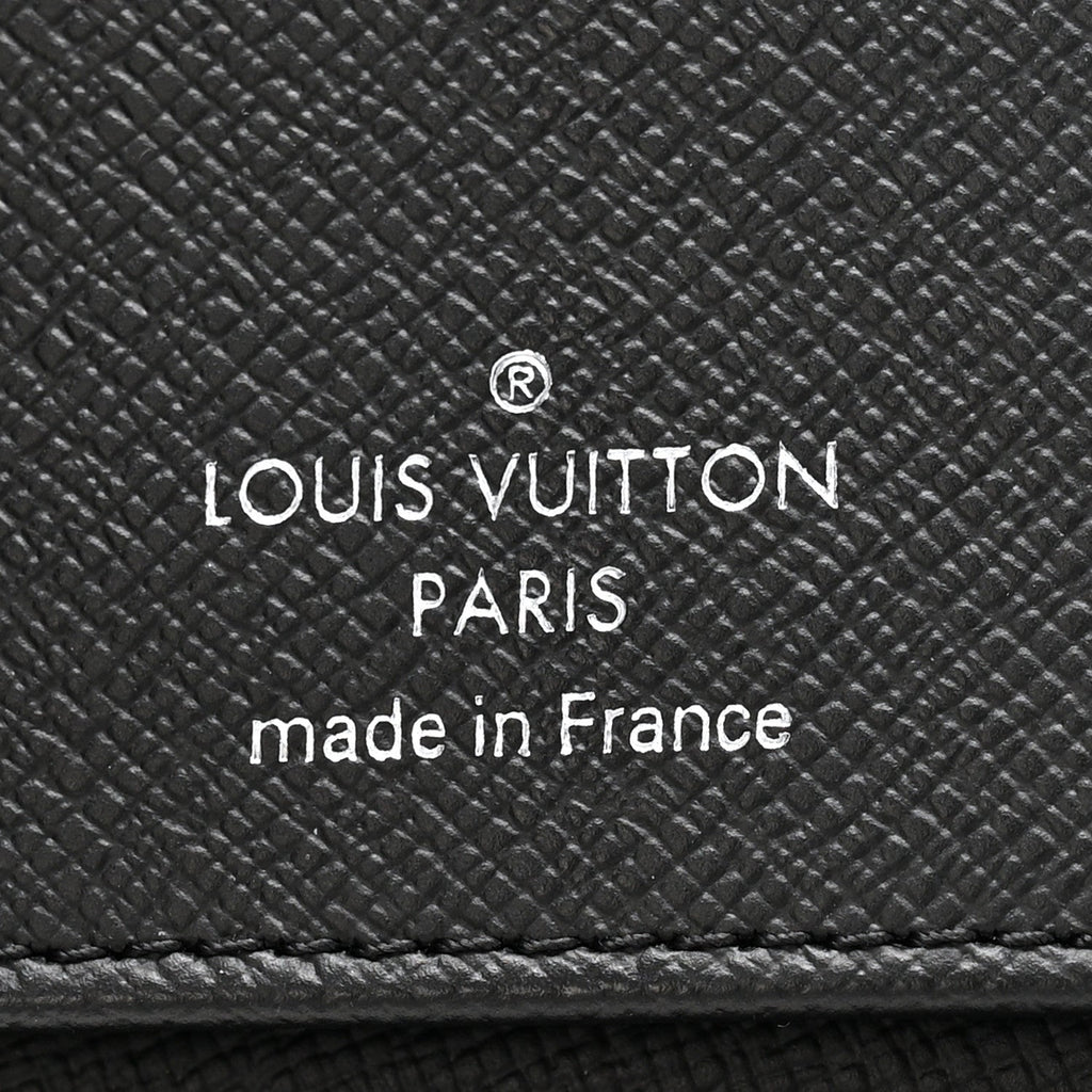 Louis Vuitton Monogram Eclipse Vertical Zippy Wallet