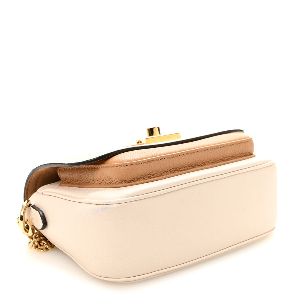 Louis Vuitton Grained Calfskin Lockme Tender Quartz