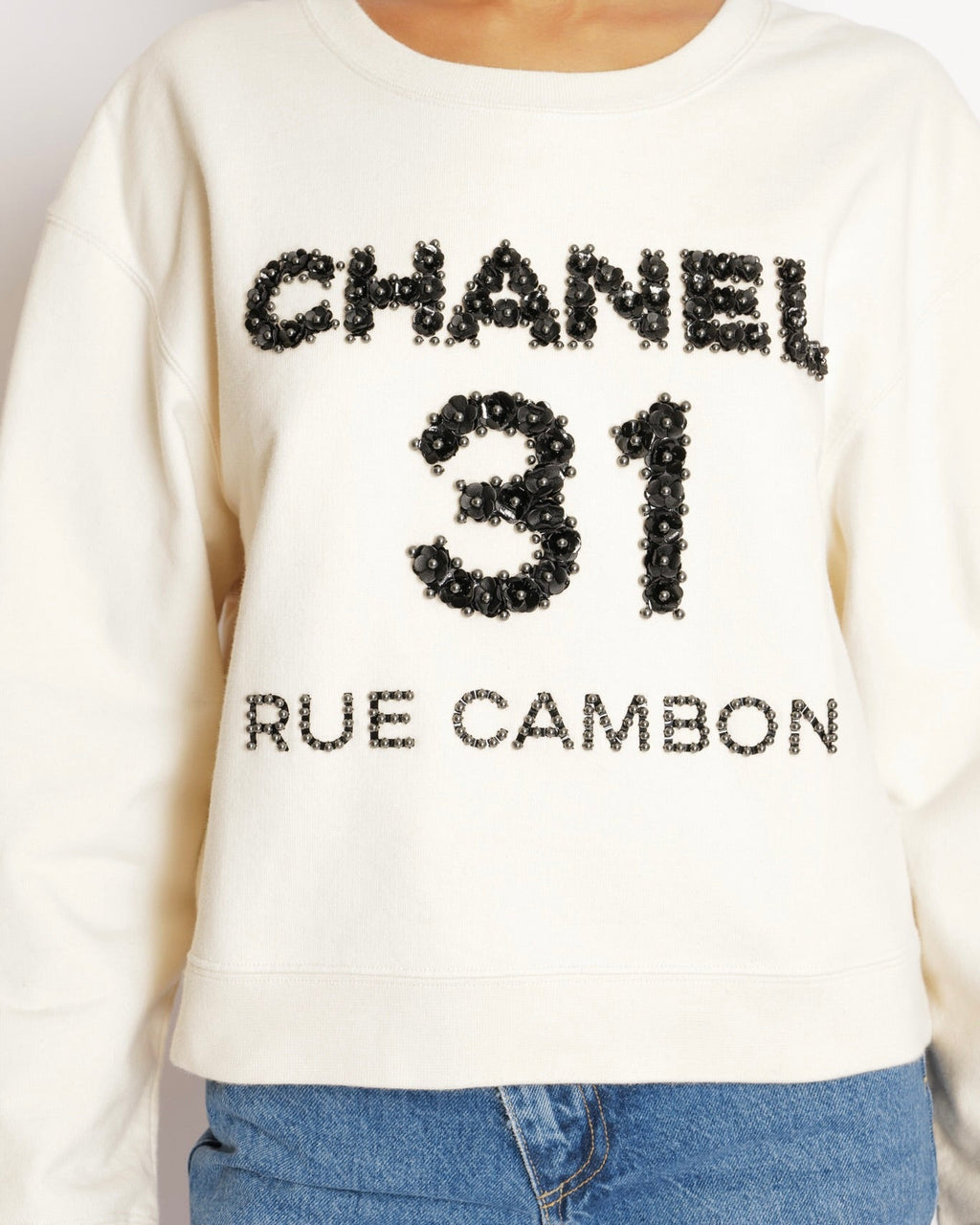Chanel Pre-Fall 2020 Beige 31 Rue Cambon Sweater with Black Floral Appliqué Logo Size L (UK 12)