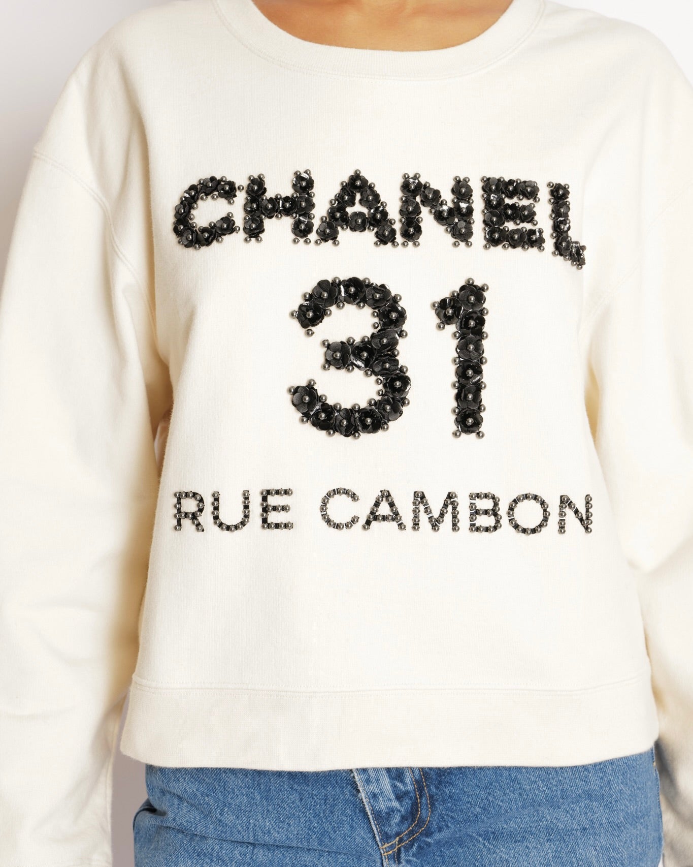 Chanel Pre-Fall 2020 Beige 31 Rue Cambon Sweater with Black Floral Appliqué Logo Size L (UK 12)