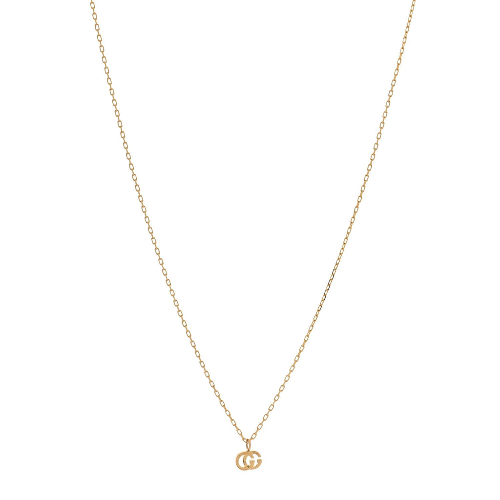 Gucci 18K Yellow Gold Blue Topaz Running G Pendant Necklace