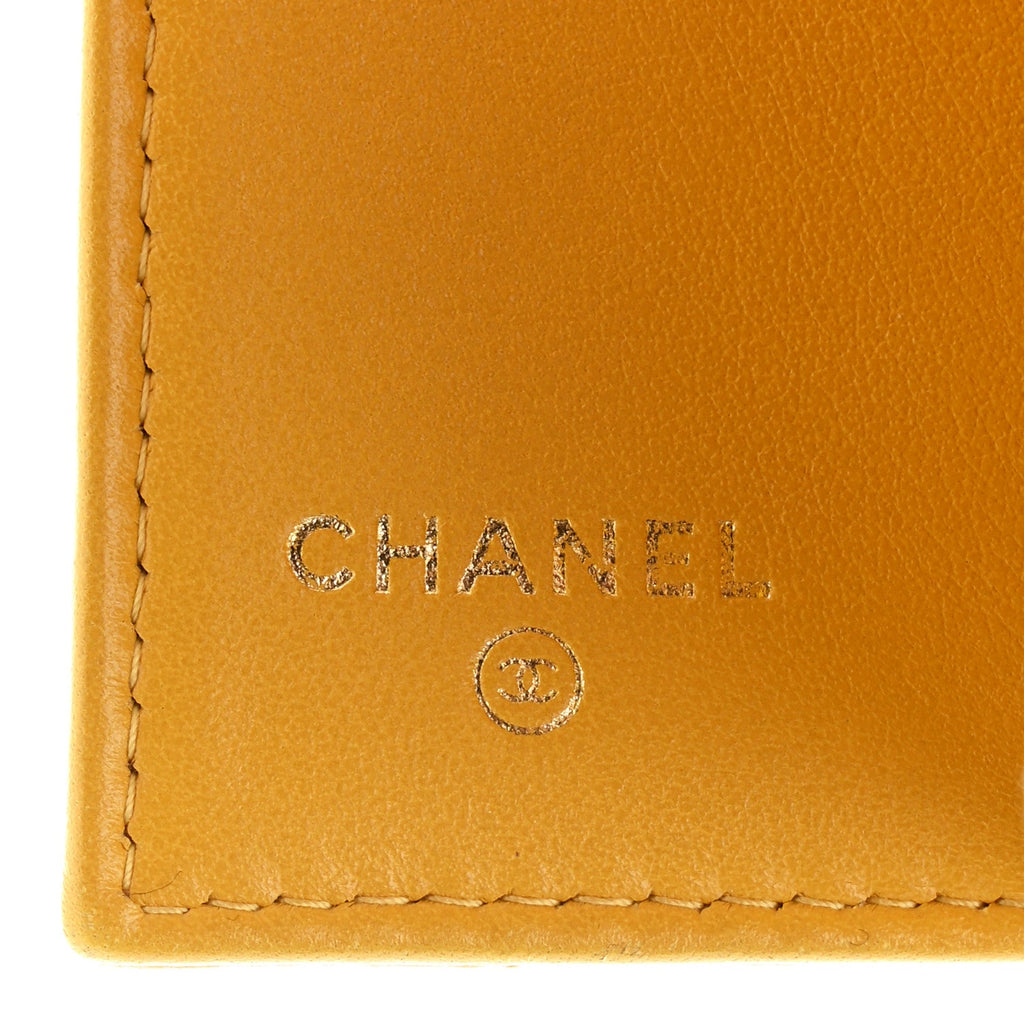 Caviar Quilted Double Flap Wallet Yellow