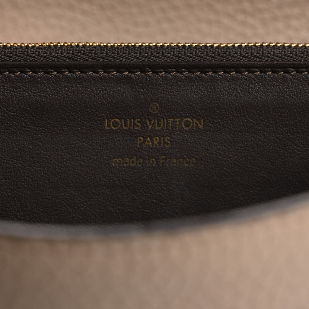 Louis Vuitton Taurillon Capucines Wallet Galet