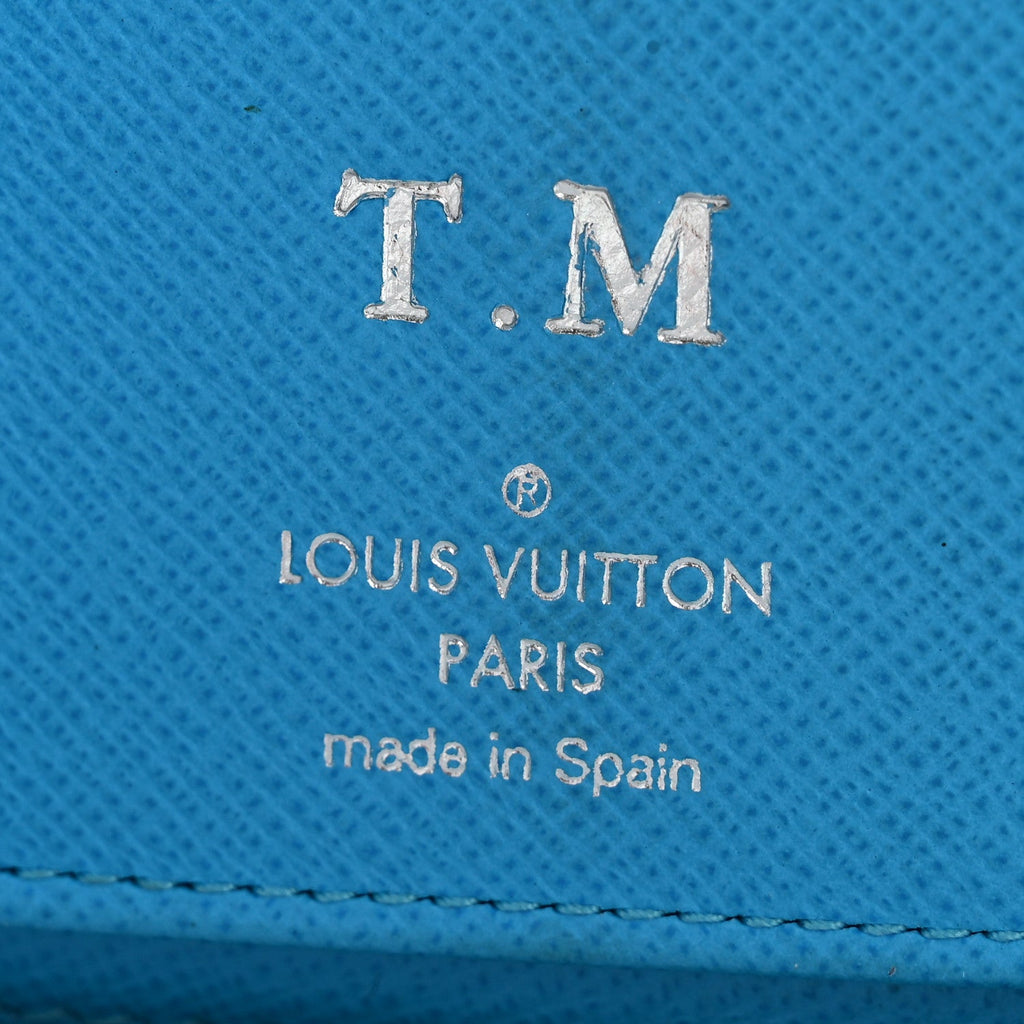 Louis Vuitton Taigarama Vertical Zippy Wallet Blue Lagoon